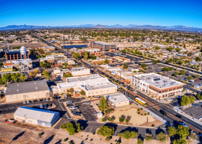 Aerial view of Gilbert with roads, trees, and buildings