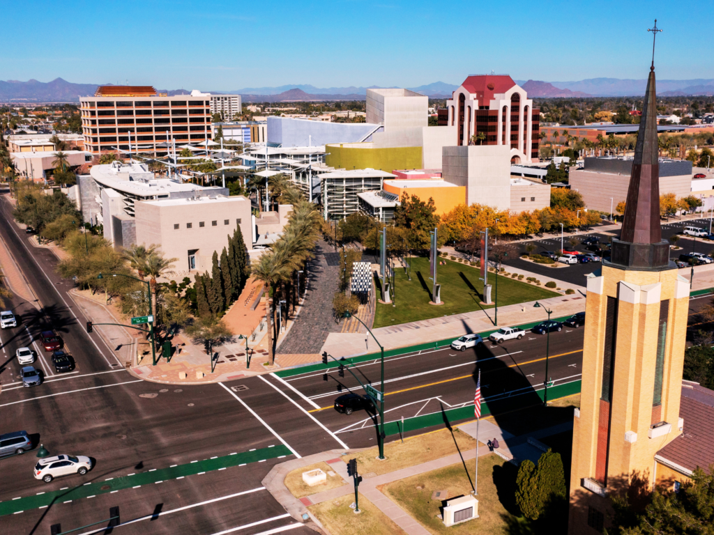 Bird's eye view of Mesa city with crossroads and buildings